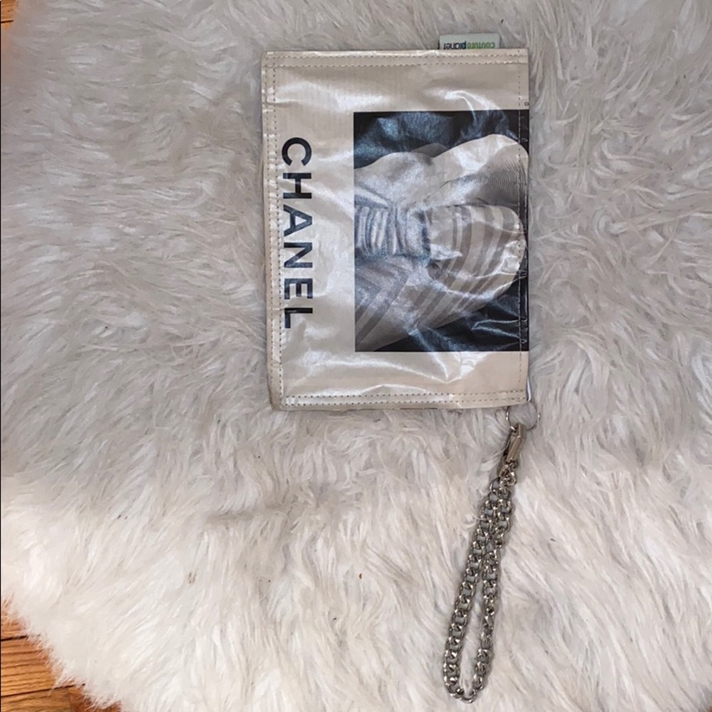 Chanel newspaper wristlet